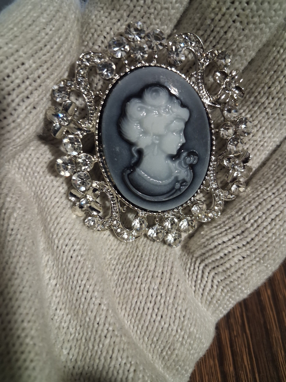 Elegant Black & White Cameo Brooch with Crystal Frame